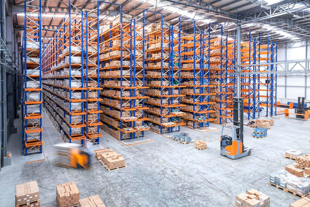 Forklifts in large warehouse