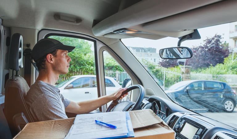 Delivery driver view of road and mirror
