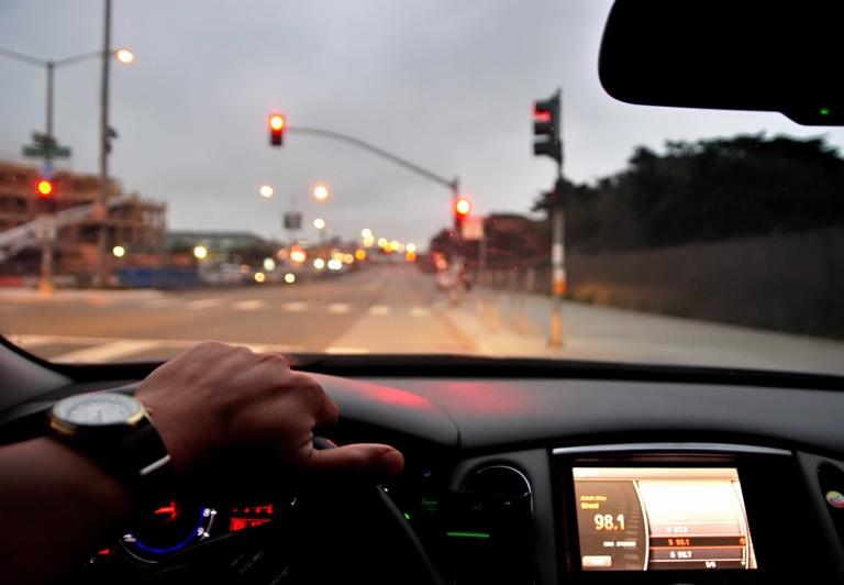 Predicting traffic light behavior to smooth out traffic in a smart city