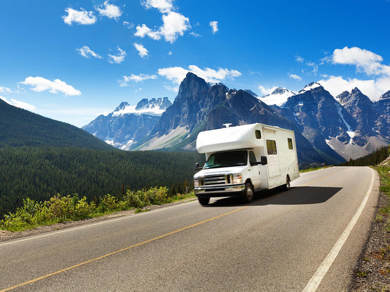 A motorhome traveling on a mountain highway.