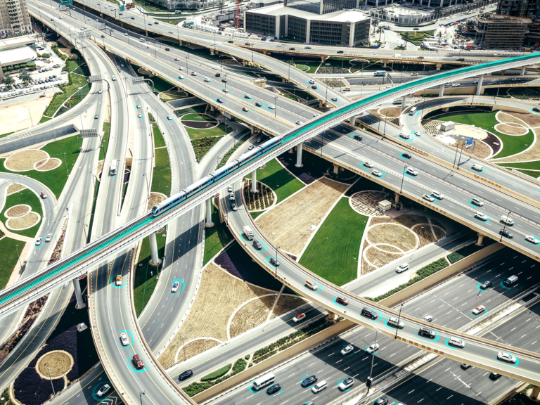 A bird's eye view of traffic navigating a highway system.