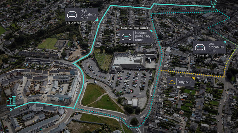 Aerial view of a city with potential routes highlighted