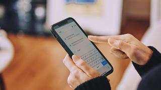 Person using search on mobile